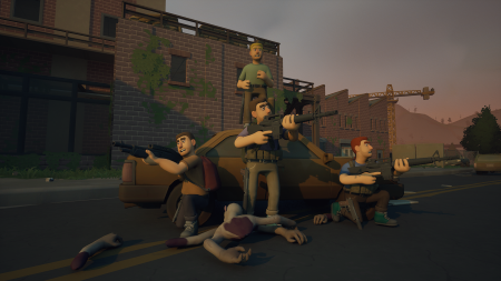 Group shot posing in front of a car